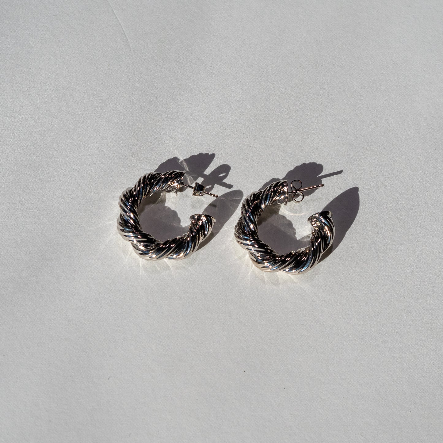 Twisted Silver Hoop Earrings Blaze and Sparkles