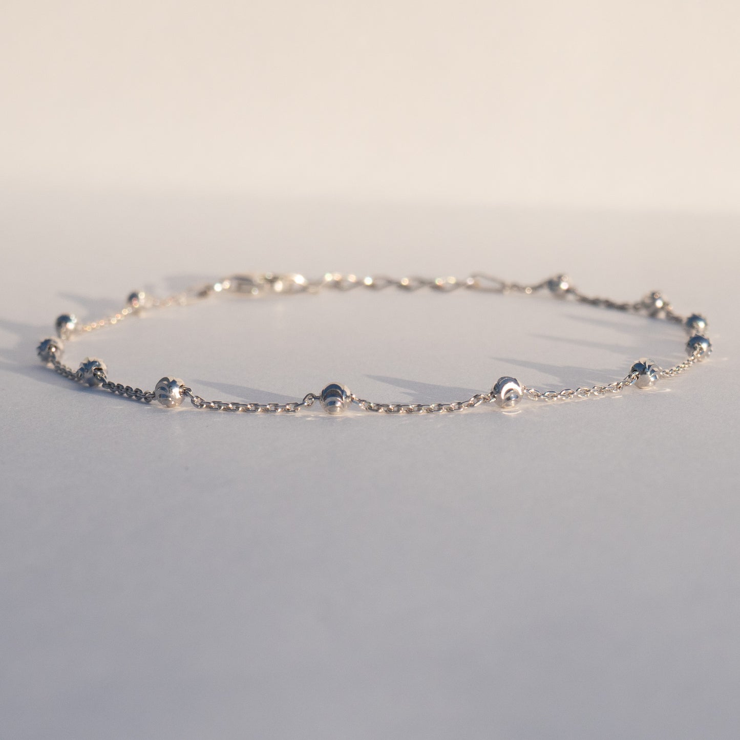 Duncan Silver Moon Cut Bead Anklet